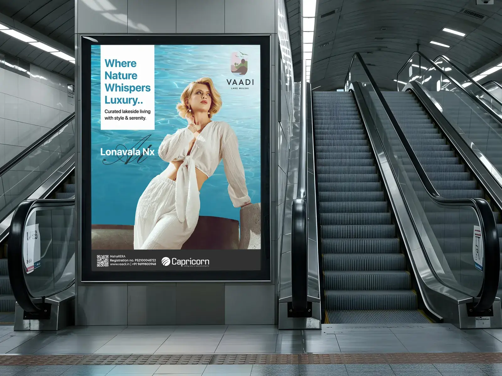 Vaadi poster beside a metro escalator
